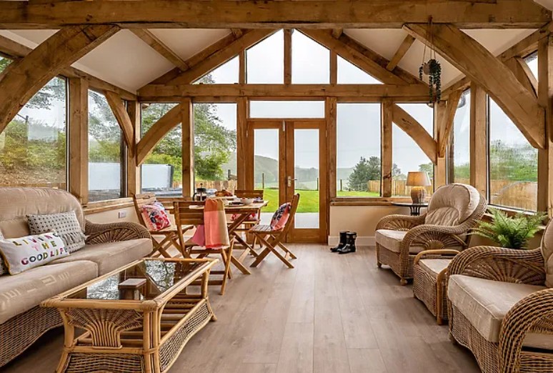 Spacious 4-bedroom farmhouse with a private hot tub near Talgarreg