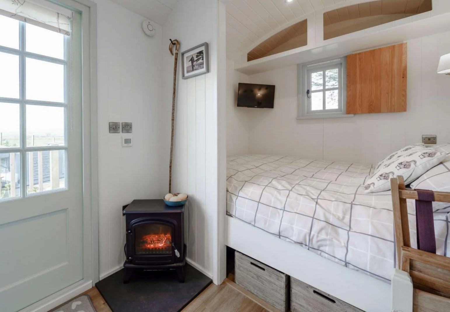 Interior of a romantic shepherd's hut for 2 with a hot tub near Sedbergh