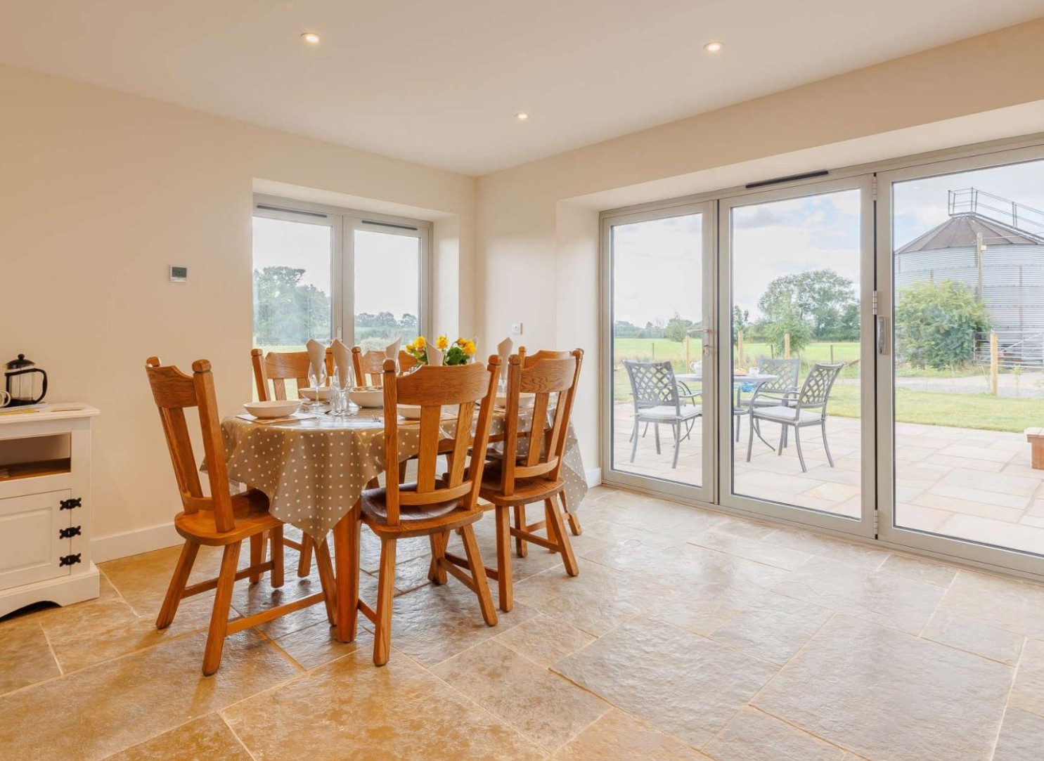 Views from a 3-bedroom barn with a private hot tub in Coton